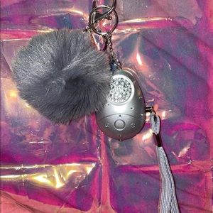 Safety alarm with Faux puff ball
